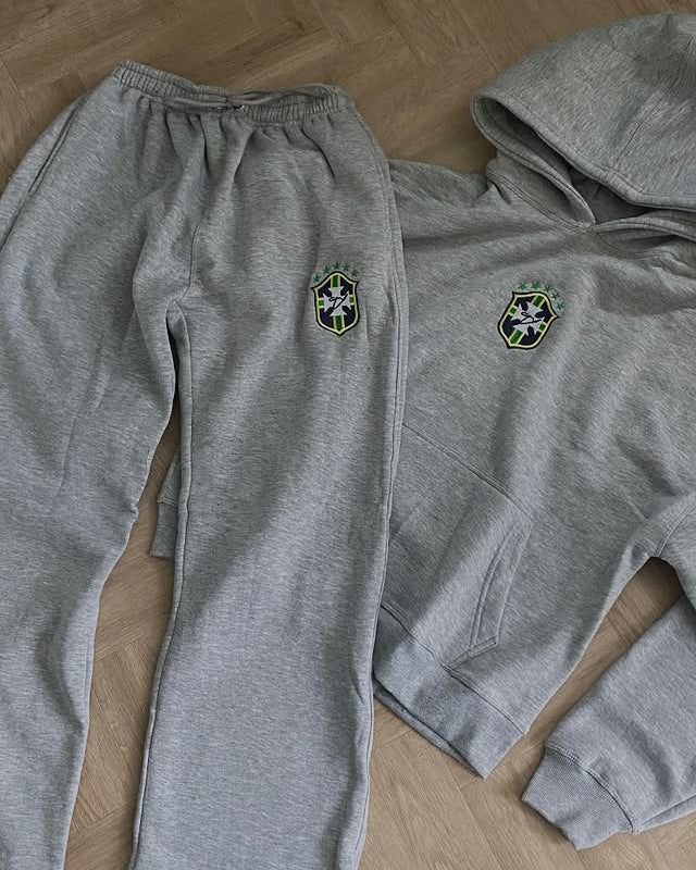 Grey BRASIL hoodie and matching joggers laid flat together