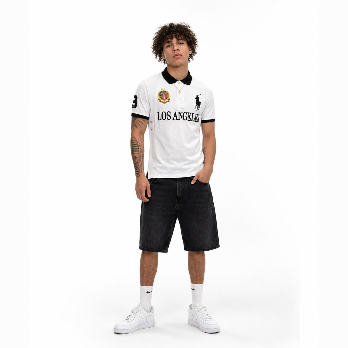GRAPHIC - POLO — model wearing white Los Angeles polo, full outfit