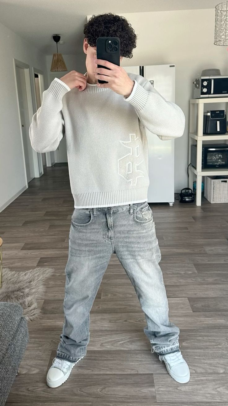 DOLLAR — OUTFIT SET — model styling reference wearing a light knit sweater and washed jeans