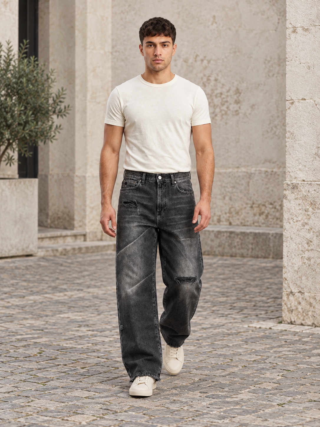 Black Shadow loose-fit washed jeans — front lifestyle view on model