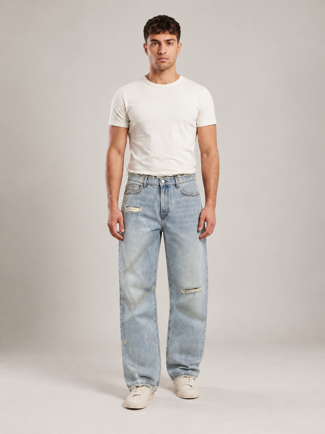 Light Blue Shadow loose-fit washed jeans — front studio view on model